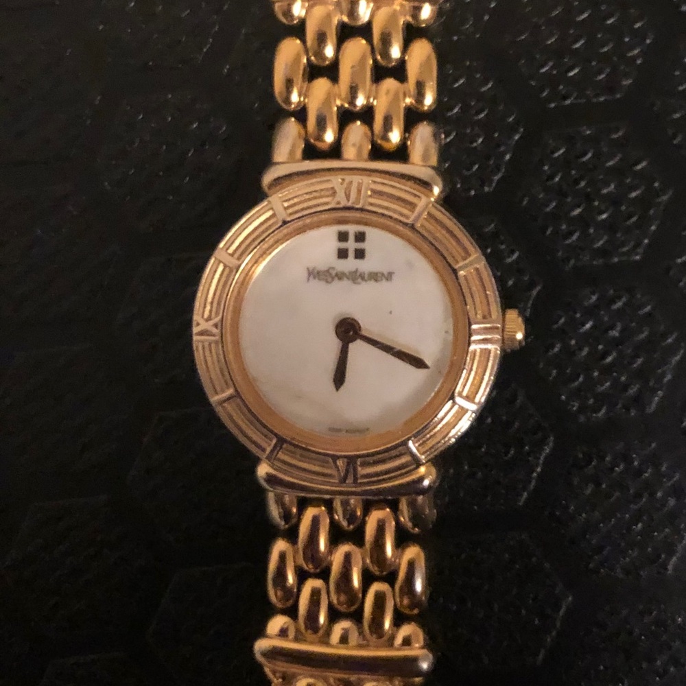 YSL Gold Tone Watch with Mother of Pearl Face - it is beautiful & worth it :)